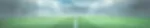 Fundo desfocado de um estádio de futebol com gramado e arquibancadas